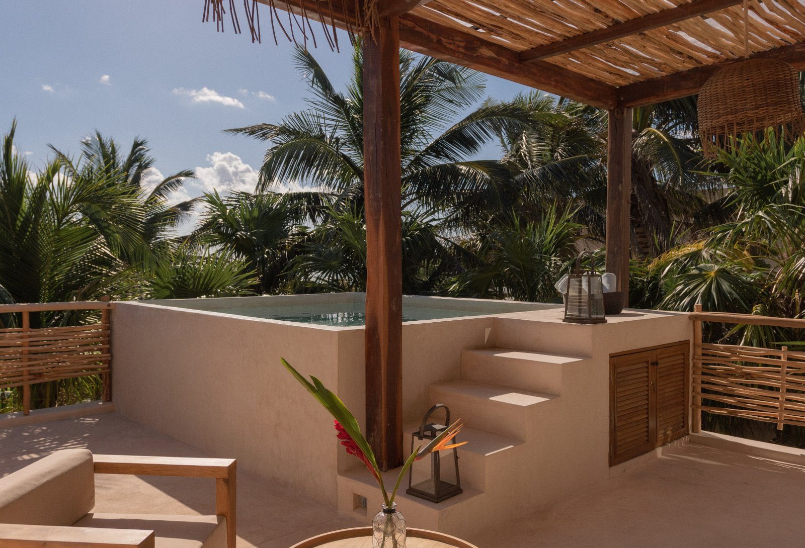 Beautiful pool with garden view on the terrace of the villa Chechén Suite in Tulum, Mexico